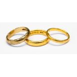 Two 22ct gold wedding bands, approx weight 8.