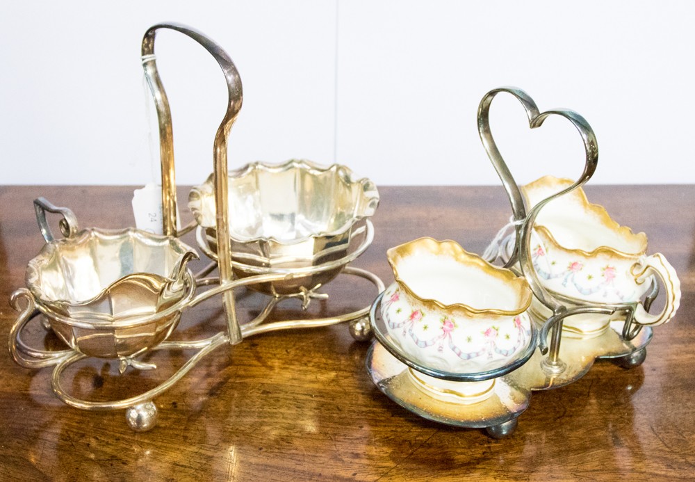 A silver plated milk and sugar set together with another,