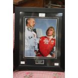 Formula 1 Memorabilia: A framed and signed Stirling Moss photograph, signed to middle left,