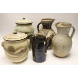 Three large stoneware pitchers together with two large bread bins and covers (5)