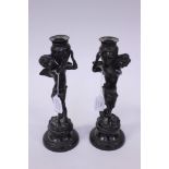 ****Ex Luddington Manor****Pair of 19th Century bronze figural candlesticks,