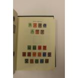 A good Windsor GB stamp album with good early section including Victoria 179 2/6d and 181 5