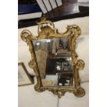 ****Ex Luddington Manor****A Rococo style gilt framed wall mirror,