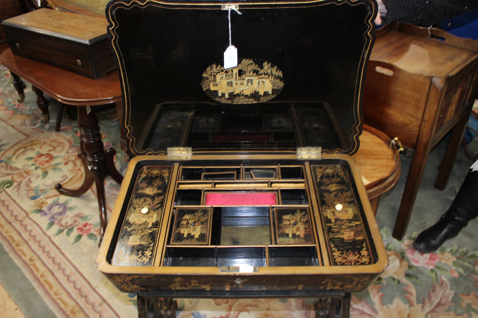 A late 19th Century Chinese export lacquered work table, circa 1880, sarcophagus hinged top, - Image 2 of 3