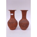 Pair of Chinese terracotta relief moulded vases (2)