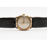 A gents Avia 9ct gold watch with cushion shaped dial, numbers and subsidiary dial,