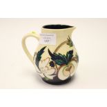 A Moorcroft limited edition 2/30 jug in the Bramble pattern, 1st quality squat jug,