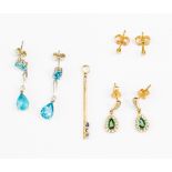 A small group of 9ct gold items to include small diamond studs, diamond and emerald earrings,