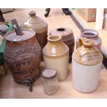 A box containing stoneware vessels with local interest, In Coope Burton upon Trent, C.