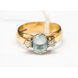 An aquamarine, diamond and opal 9ct yellow gold dress ring,