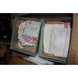 A box containing stamp collecting catalogues & a quantity of used stamps