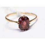 9ct gold ring with a garnet stone