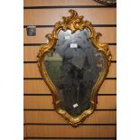 Two oval mirrors in gilt frames