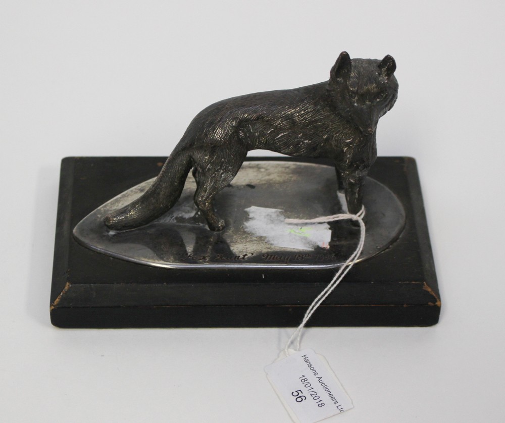 Sporting/Hunting interest: A George VI white metal model of a Fox mounted on a shaped oval base