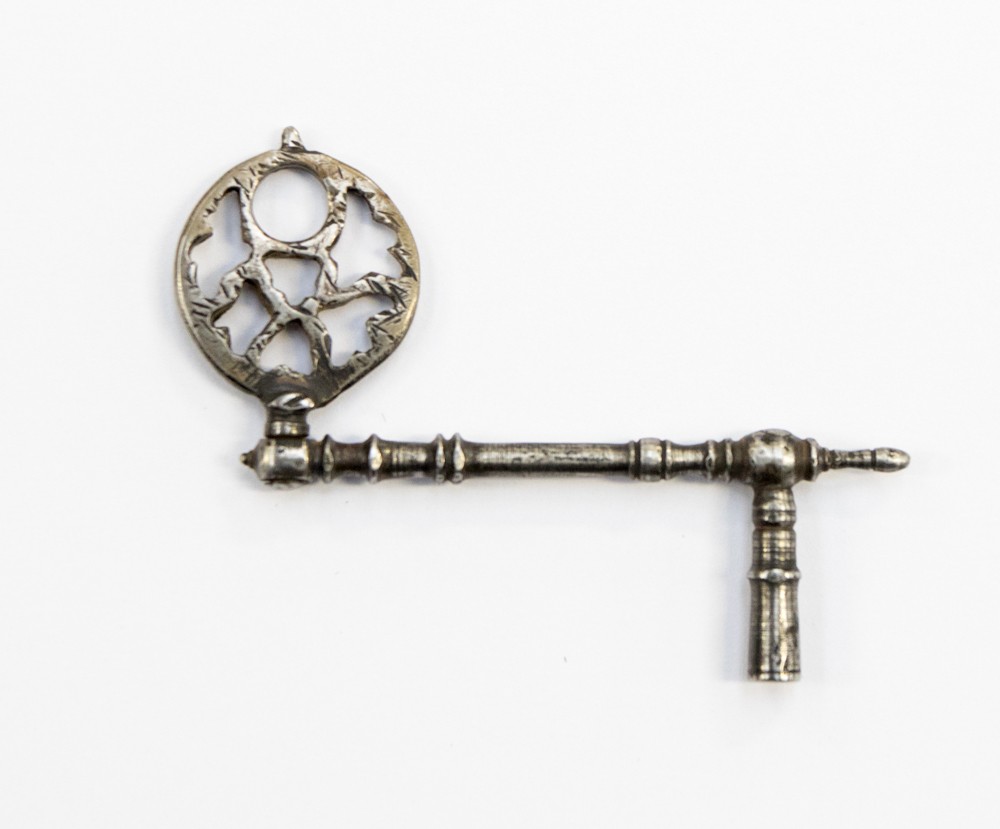 A mid 17th Century white metal pocket watch key,