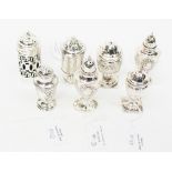 Seven various silver hallmarked pepperettes, one with liner, 7.