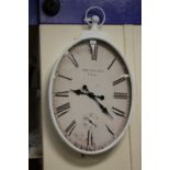 ****Ex Luddington Manor****A large wall clock, inscribed 'The New Era, Paris',