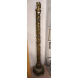 A 19th century floor standing decorative torchere gilt carved in Chinese