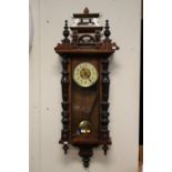 An Art Nouveau Vienna walnut cased wall clock, circa 1900, eight day movement,