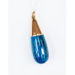 A blue jasper drop shape pendant, with a rose metal cap unmarked,