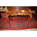 A 19th Century burr walnut games table in the Louis XVI style, circa 1870,