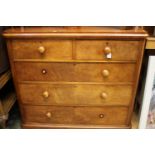A Victorian mahogany chest of drawers, fitted with two short over three long graduated drawers,