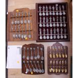 Pewter spoons (Franklin Mint) with certs, together with gilt metal spoons,