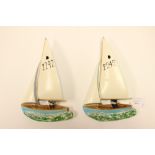 A pair of Beswick wall plaques modelled as a 'Bell' yacht, model number 1632, blue hull,