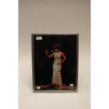 A signed , framed and glazed photograph of Shirley Bassey,