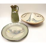 A large stoneware bowl with fish decoration and a large stoneware platter,