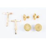 A pair of gentleman's 18ct gold stamped dressing studs,