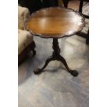 ****Ex Luddington Manor****A carved mahogany dished top table,