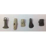 Five miniature late Bronze Age votive axes, two of lead,