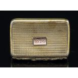 A George III silver gilt snuff box, engine turned rattan weave design, with cast foliate thumbpiece,