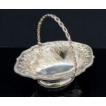 An Edwardian silver bon bon basket, ovoid footed form,