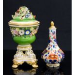 A Derby Bloor florally encrusted pedestal potpourri, circa 1825, on four bracket feet, green ground,