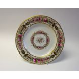 A Derby porcelain monogrammed plate, circa 1820,