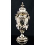 A George V silver shaker, Neoclassical pedestal urn form,