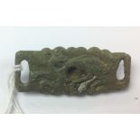 Viking bronze strap junction with Boree style decoration in the form of high relief beast head to