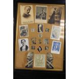 Pair of framed early 20th century magician pictures/ephemera,