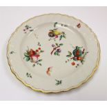 A Derby Chelsea dessert plate, circa 1769-75, fruit and floral sprigs with insects,