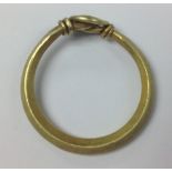 Anglo Scandinavian Gold ring with bond of lozenge wire ends twisted together forming a spiral.