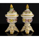 A pair of Derby King Street florally encrusted potpourri vases and covers,