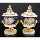 A pair of Derby Bloor porcelain florally encrusted pot pourri vases, 1830-35,