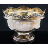 A George V silver footed bowl, moulded and arcaded border, Chester 1927, 20cm diameter, 10.