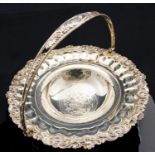 A George III silver bread basket, circular pedestal bowl form with swing handle, crimped rim,