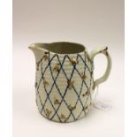 A relief moulded beehive jug, with bees on lattice ground, Pearlware,