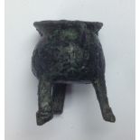 Medieval bronze toy cauldron with circular flaring rim, waisted neck,