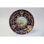 A Derby porcelain scene painted tea plate, circa 1810, Devenish Island, within gilt foliate border,