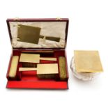 An Art Deco style 9ct gold mounted dressing table set, engine turned barley design, geometric form,